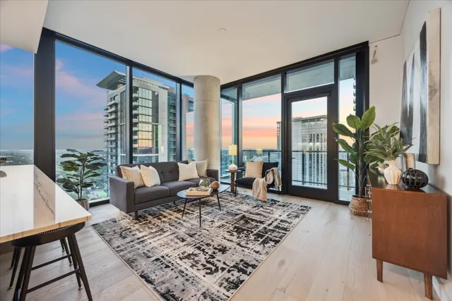 a view of a workspace with a table and chair