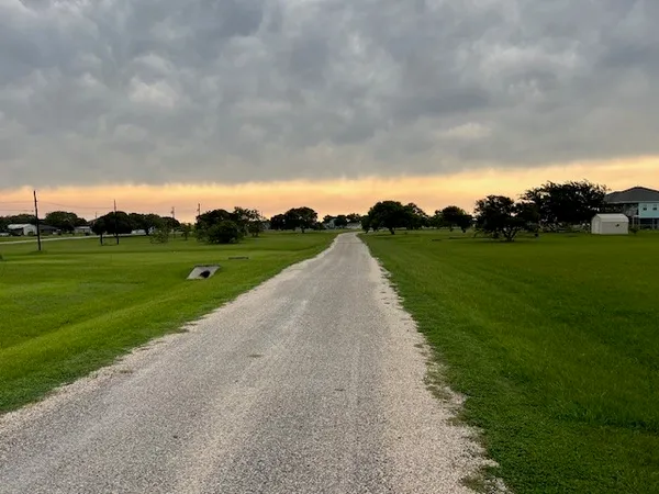 a view of a golf course with a garden