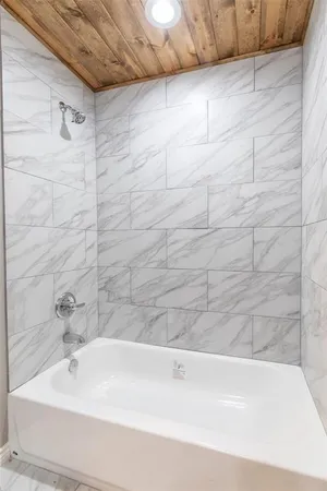 a bathroom with a bathtub