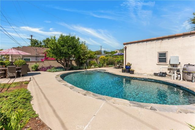 a view of yard with patio
