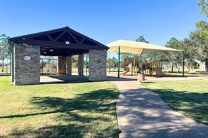 8310 Rose Petals Lane Rosharon, TX 77583 - Photo 25 of 31 Southern Colony residents enjoy beautifully maintained community amenities, including a covered pavilion, picnic area, walking paths, and nearby playground—perfect for outdoor recreation, family gatherings, and relaxing with neighbors.