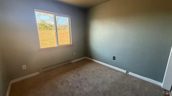 a view of small space with racks on the wall