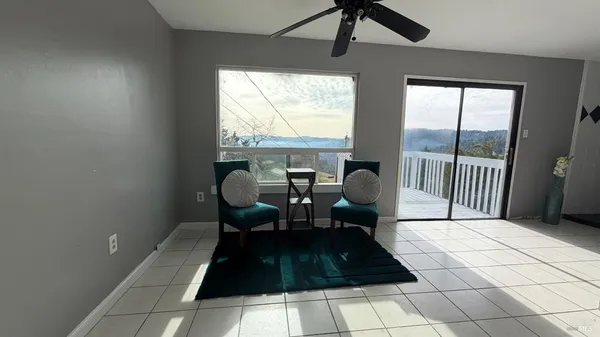 a view of a room with windows