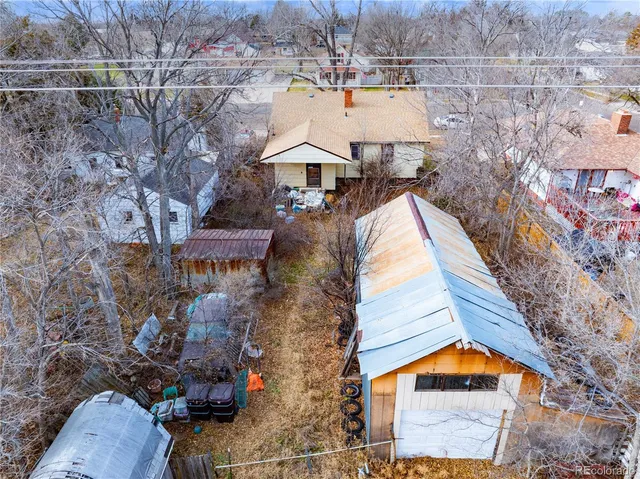 a view of swimming pool with a yard and sitting area