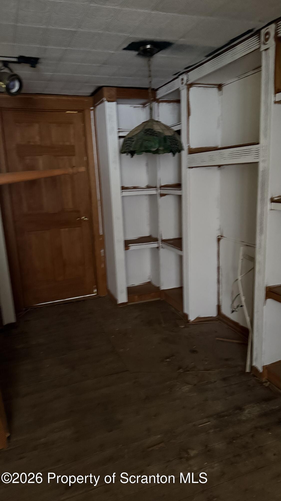 1140 Hampton Street Scranton, PA 18504 - Photo 5 of 8 a view of walk in closet with empty racks