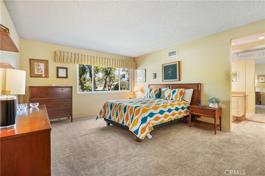 1423 La Canada Drive Brea, CA 92821 - Photo 10 of 43 a bedroom with a bed and a couch