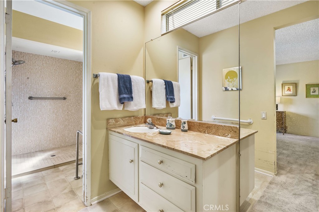 1423 La Canada Drive Brea, CA 92821 - Photo 12 of 43 a bathroom with a sink and a mirror