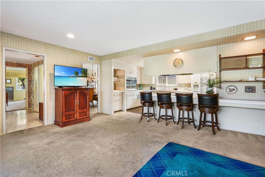 1423 La Canada Drive Brea, CA 92821 - Photo 16 of 43 a view of a dining room with furniture and wooden floor