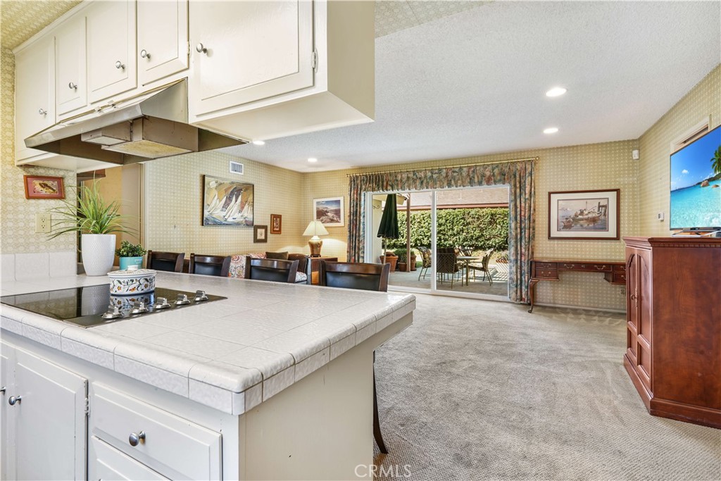 1423 La Canada Drive Brea, CA 92821 - Photo 23 of 43 a kitchen with stainless steel appliances granite countertop a sink and cabinets