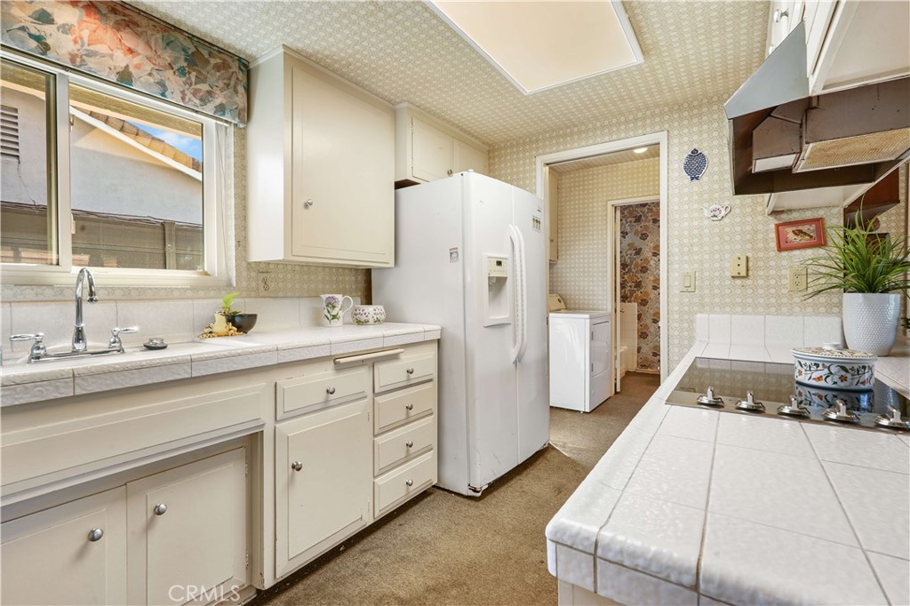 1423 La Canada Drive Brea, CA 92821 - Photo 24 of 43 a spacious bathroom with a double vanity sink a mirror and a shower