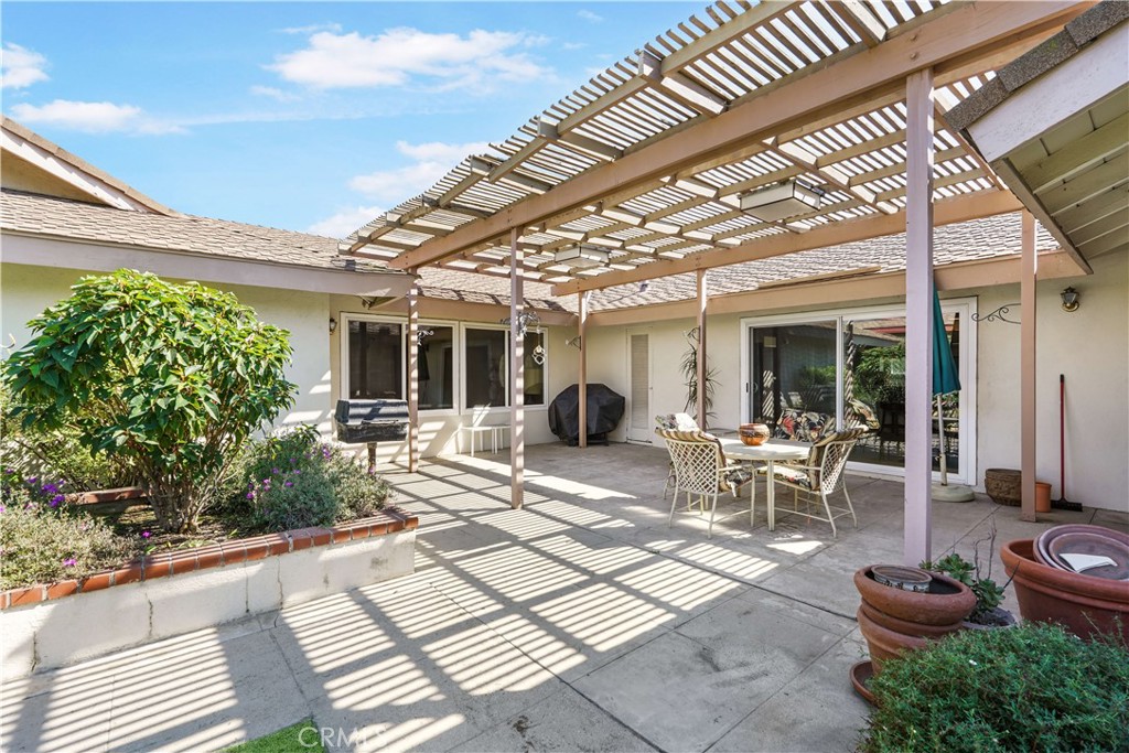 1423 La Canada Drive Brea, CA 92821 - Photo 36 of 43 a view of a patio with table and chairs and potted plants