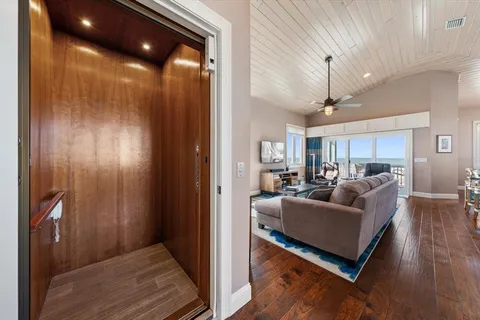 a view of a chair and table in the balcony