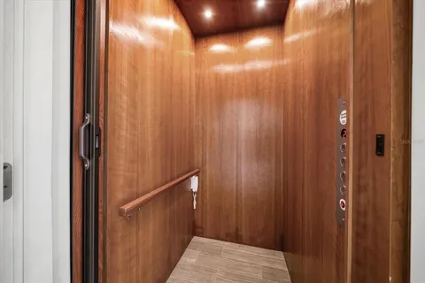 a bathroom with a granite countertop sink shower and a mirror