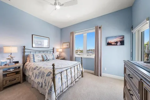 a view of a balcony with furniture