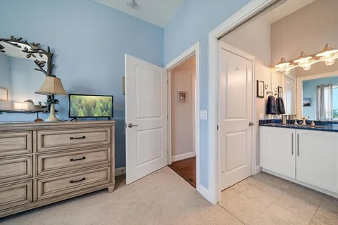 a view of a balcony with furniture