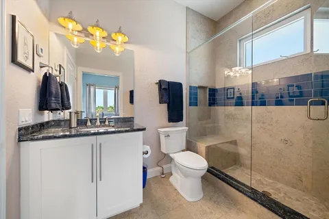 a view of a terrace with a table and chairs