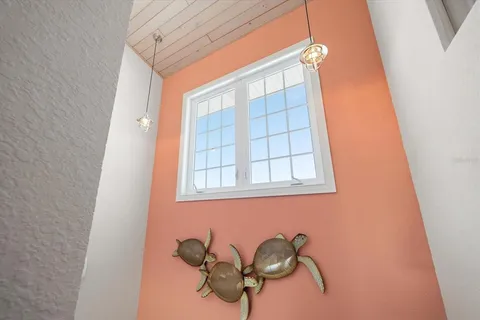 a room with a book shelf and a bookshelf