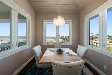 a kitchen with granite countertop a stove and cabinets