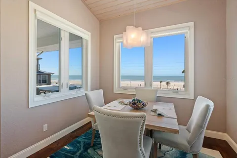 a terrace with a table and chairs