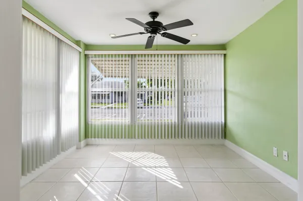 a view of livingroom with floor to ceiling window