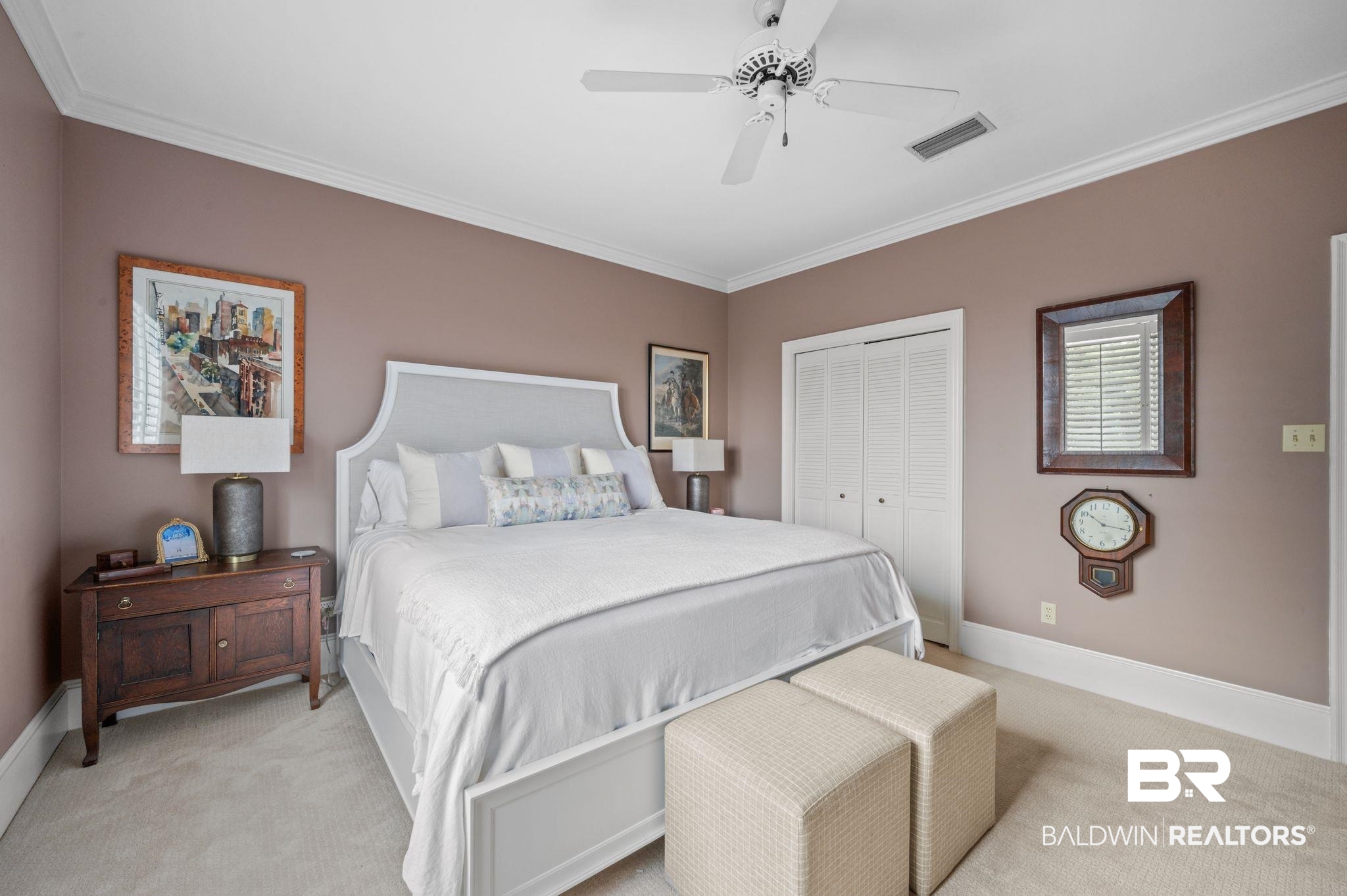 31800 River Road Orange Beach, AL 36561 - Photo 34 of 69 Bedroom with a closet, ceiling fan, ornamental molding, and light carpet