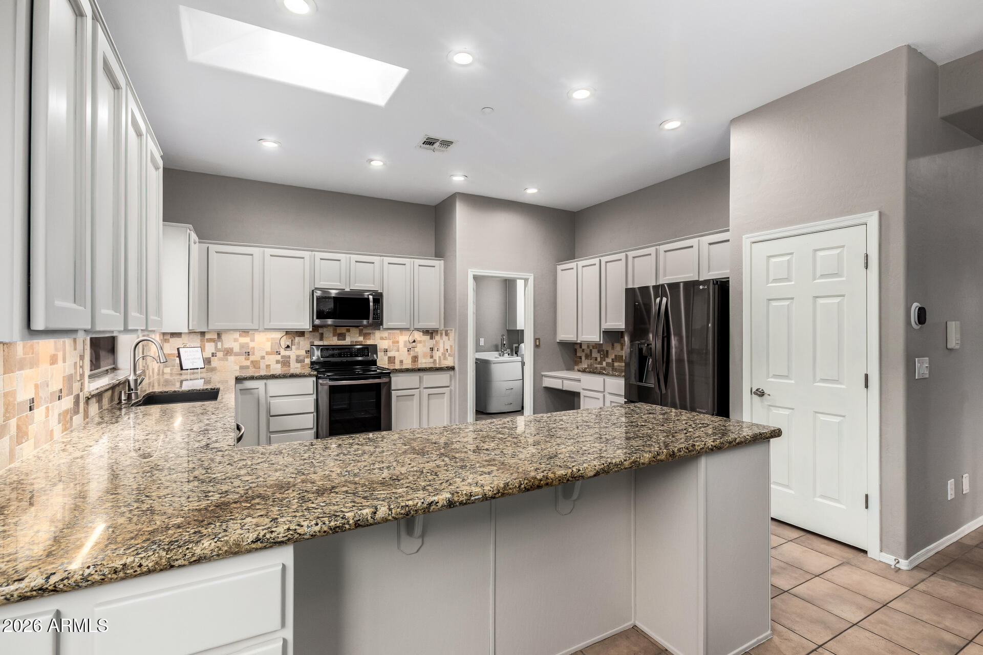 41749 North Golf Crest Road Anthem, AZ 85086 - Photo 10 of 45 Lots of storage in this kitchen