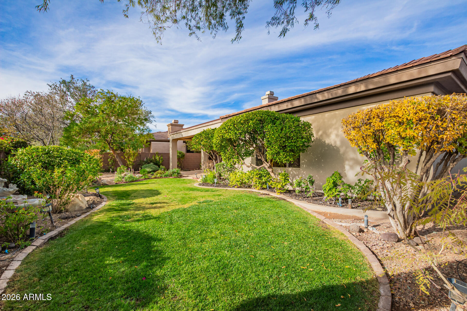 41749 North Golf Crest Road Anthem, AZ 85086 - Photo 28 of 45 Big Backyard with beautiful plants