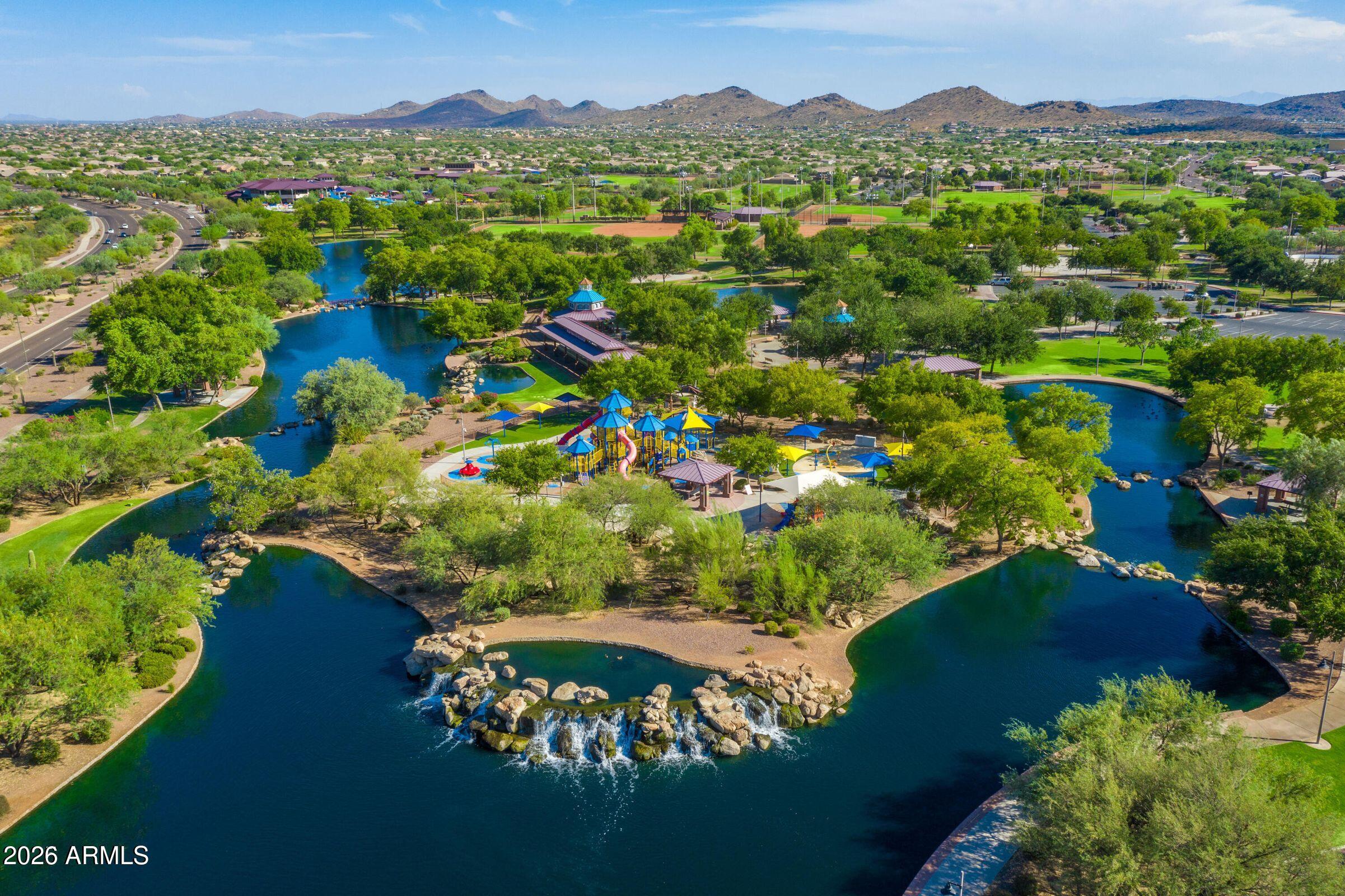 41749 North Golf Crest Road Anthem, AZ 85086 - Photo 32 of 45 a view of a city with lush green forest