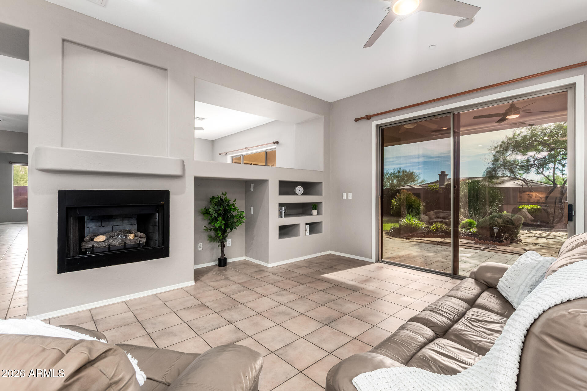 41749 North Golf Crest Road Anthem, AZ 85086 - Photo 8 of 45 Family room with gas fireplace