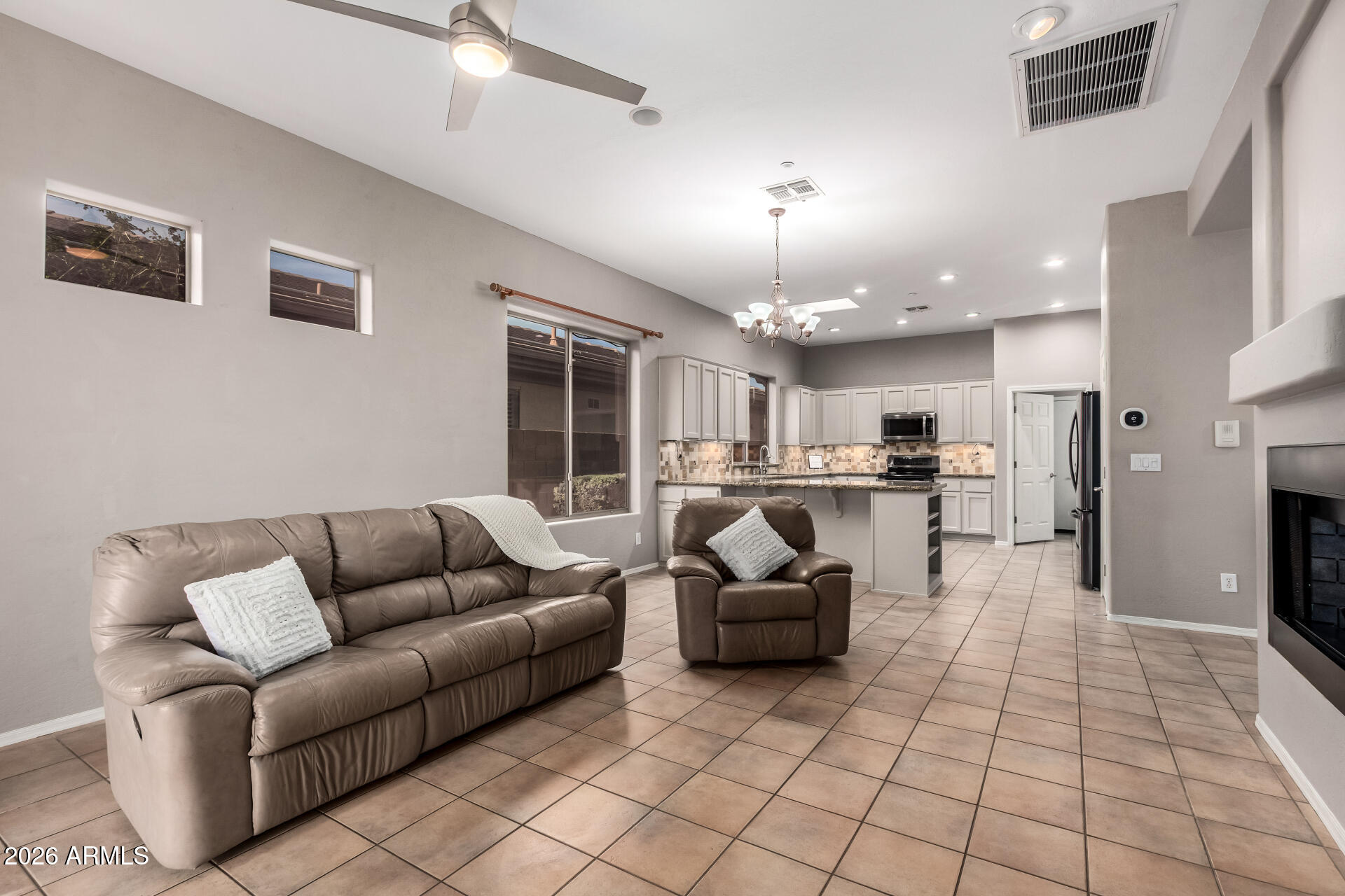 41749 North Golf Crest Road Anthem, AZ 85086 - Photo 9 of 45 Great room with open kitchen