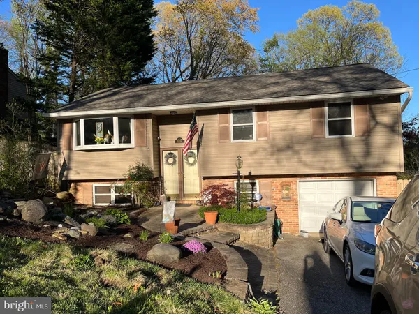 a front view of a house with patio
