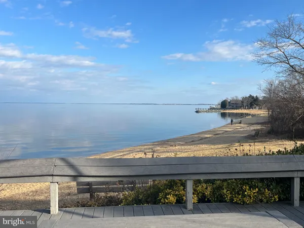 a view of backyard with seating space