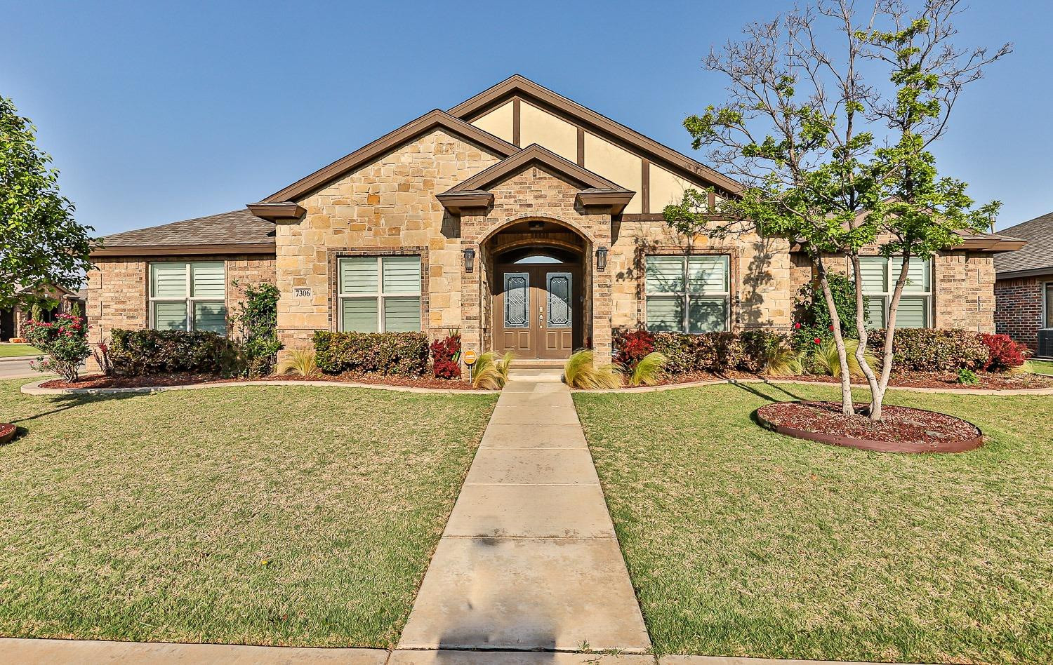 a view of outdoor space yard and front view of a house