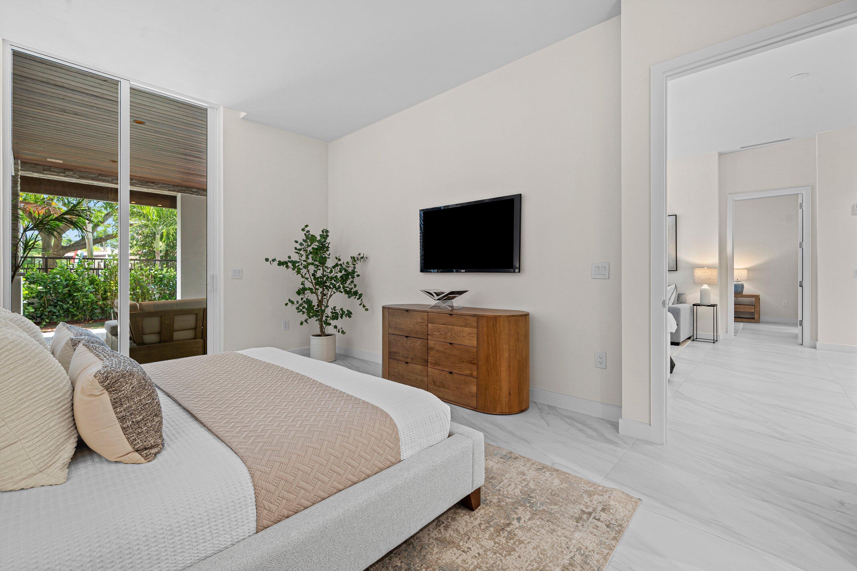 220 Southeast Mizner Boulevard, Unit 102 Boca Raton, FL 33432 - Photo 14 of 55 Primary Bedroom
