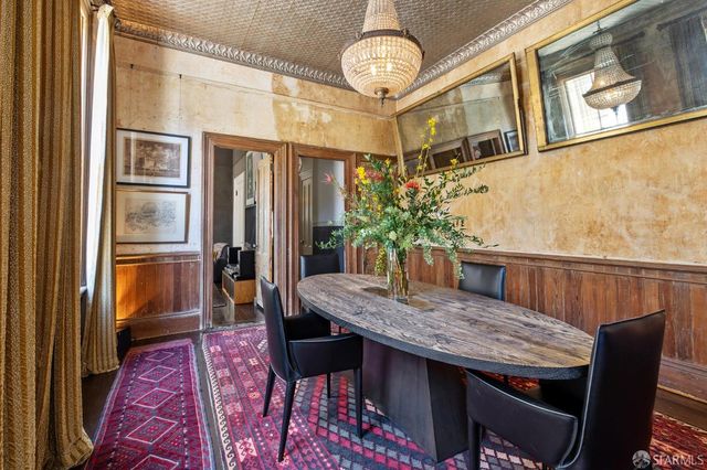 a vase of flowers sitting on a table