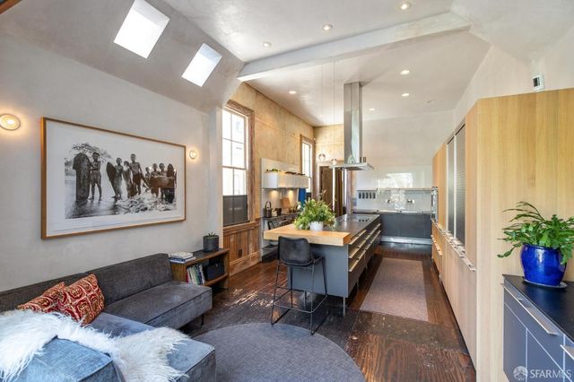 a living room with a couch and a flat screen tv