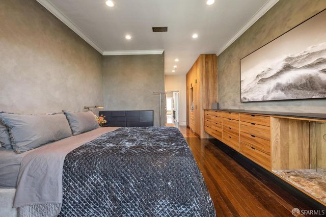 a spacious bathroom with a granite countertop sink and a mirror