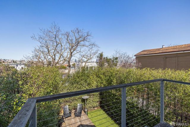 a bathroom with a tub sink and a mirror