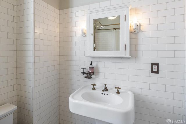 a view of a room that has a fireplace