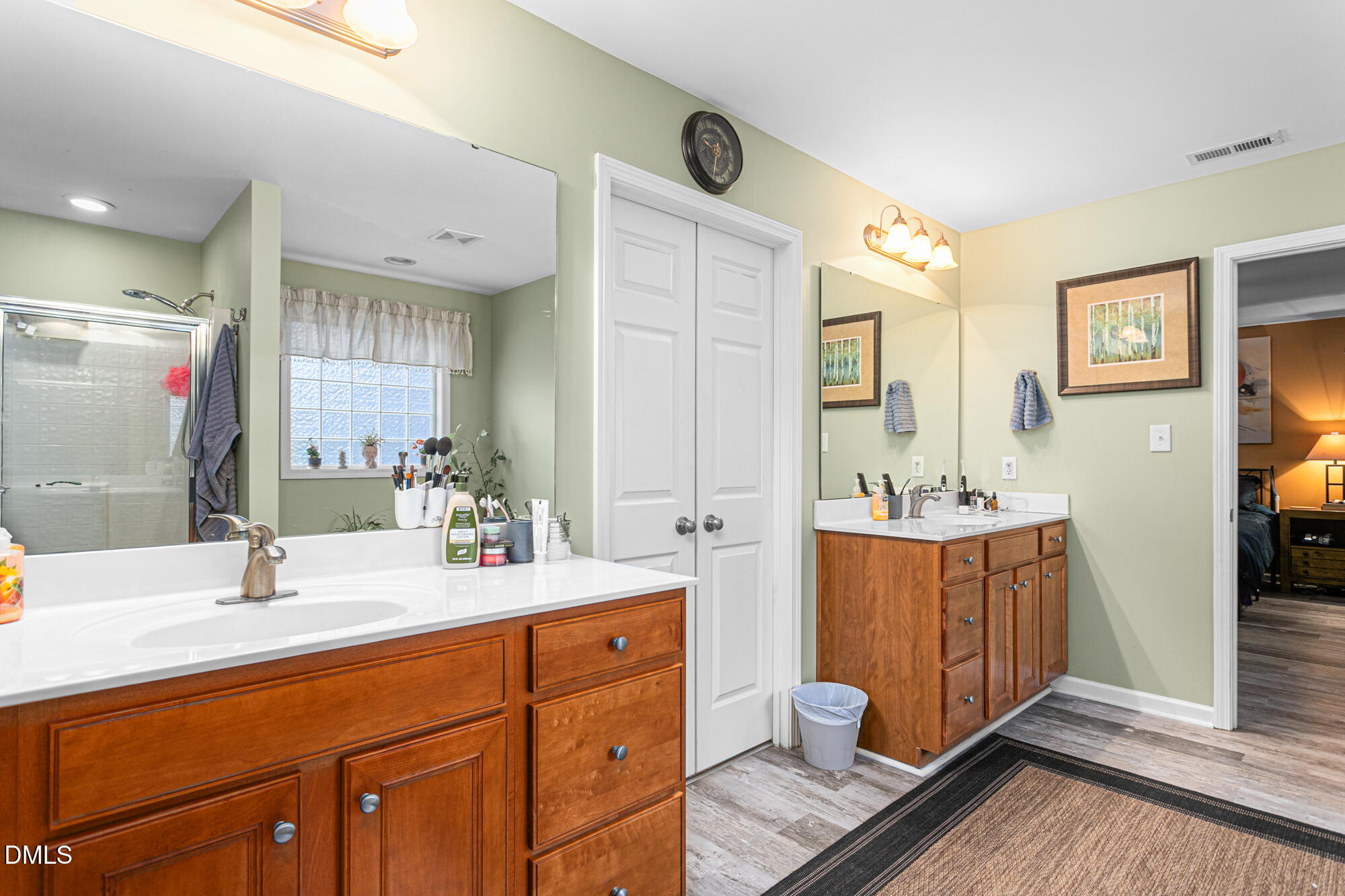 1205 Magnolia Hill Road Garner, NC 27529 - Photo 19 of 41 a bathroom with a tub sink and mirror
