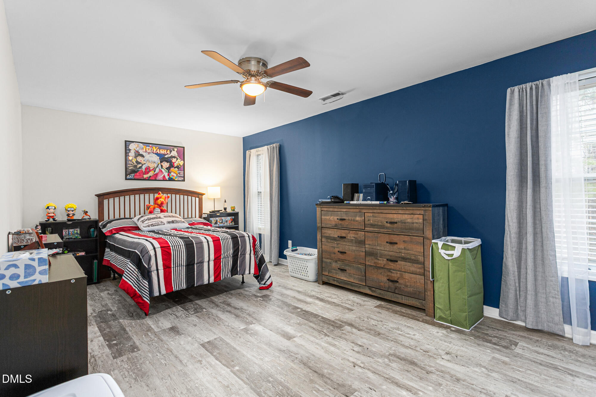 1205 Magnolia Hill Road Garner, NC 27529 - Photo 24 of 41 a bedroom with a bed and a window