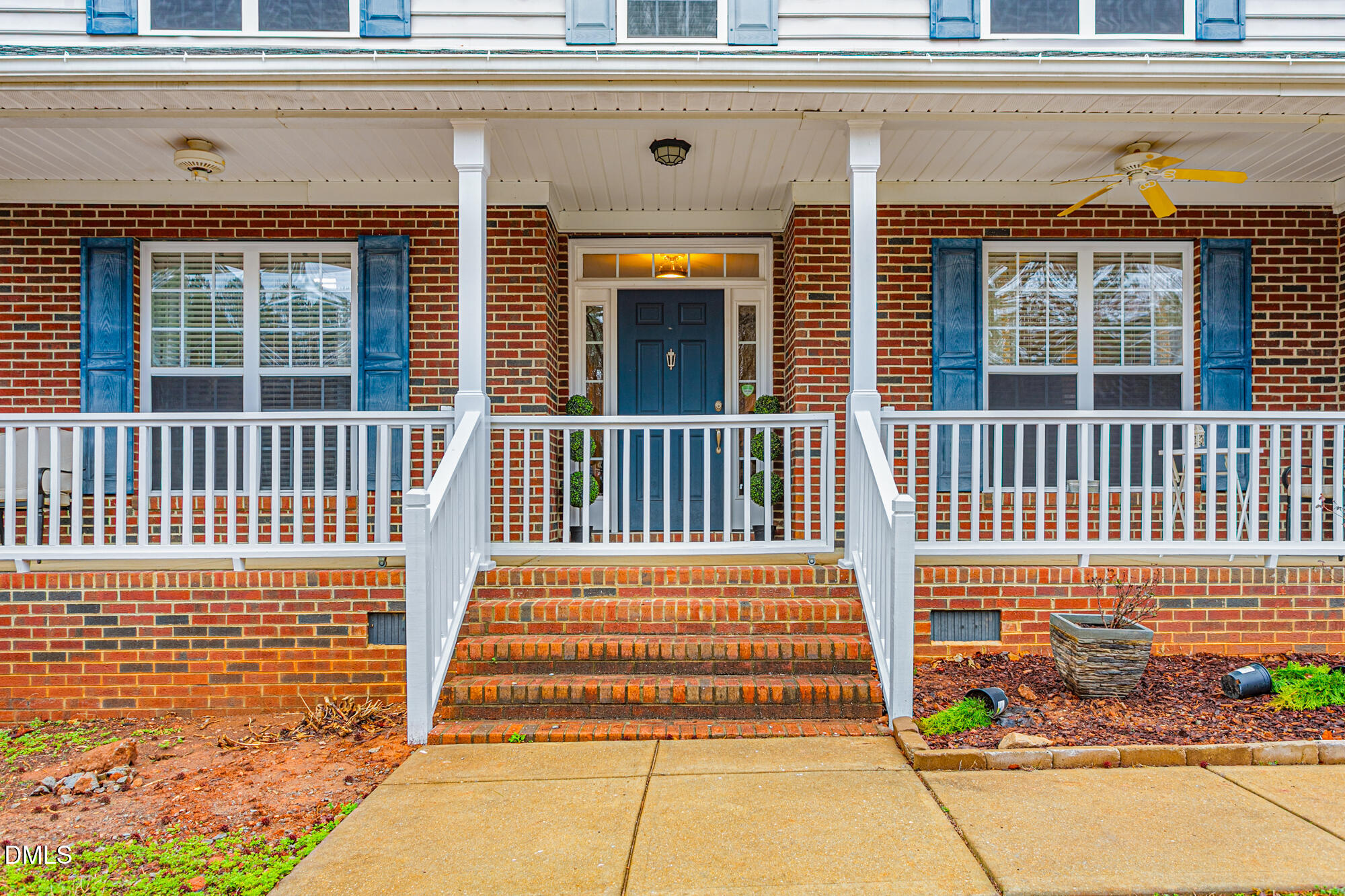 1205 Magnolia Hill Road Garner, NC 27529 - Photo 2 of 41 a front view of a house with a porch