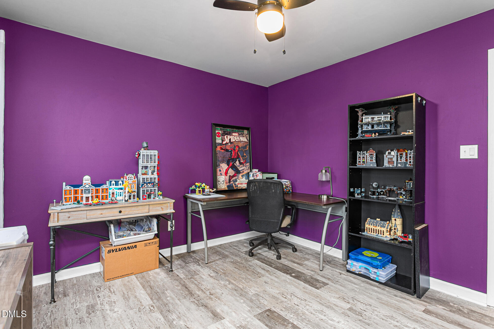 1205 Magnolia Hill Road Garner, NC 27529 - Photo 32 of 41 a living room with furniture and wooden floor
