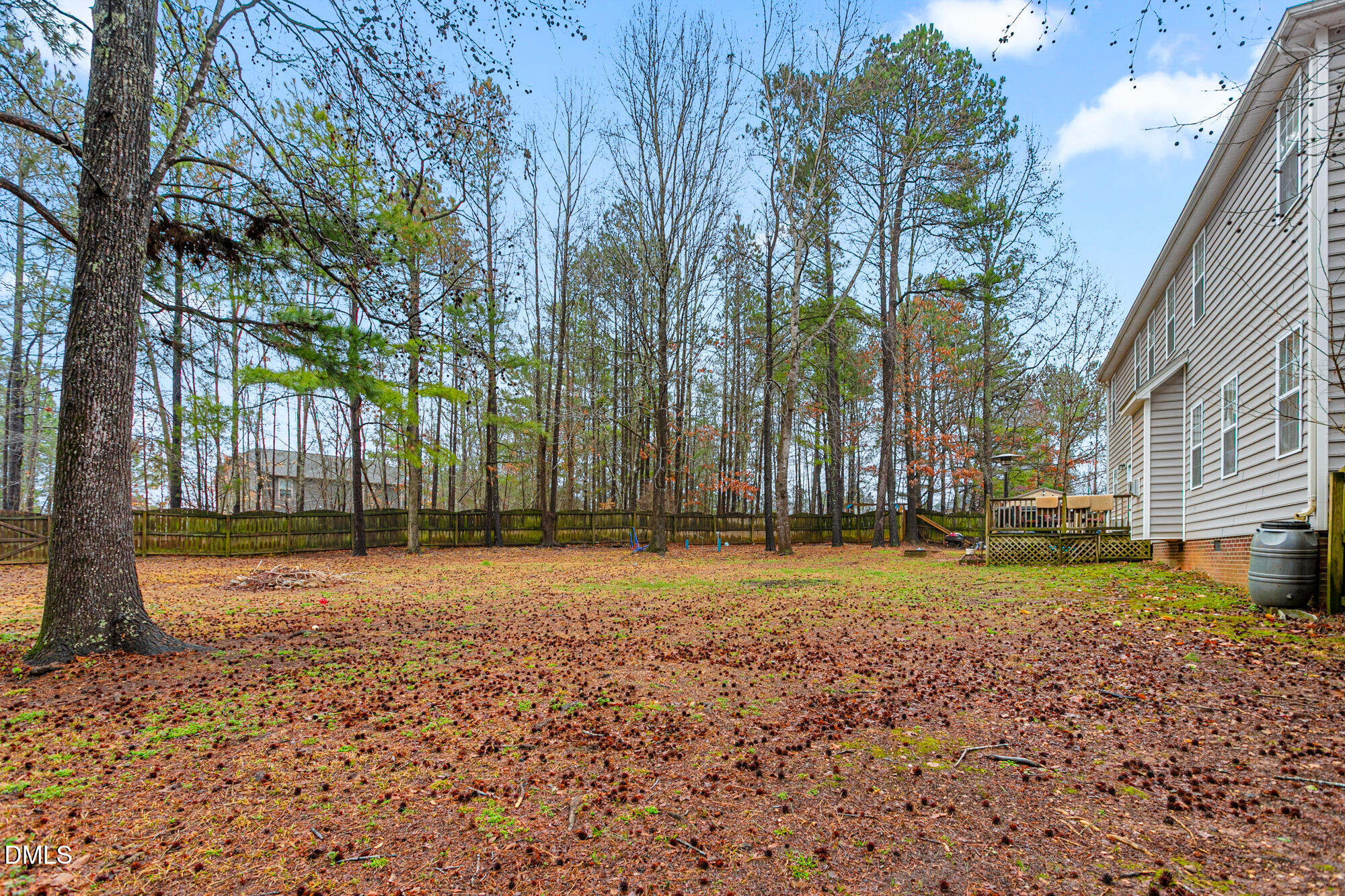 1205 Magnolia Hill Road Garner, NC 27529 - Photo 35 of 41 a house with trees in front of it