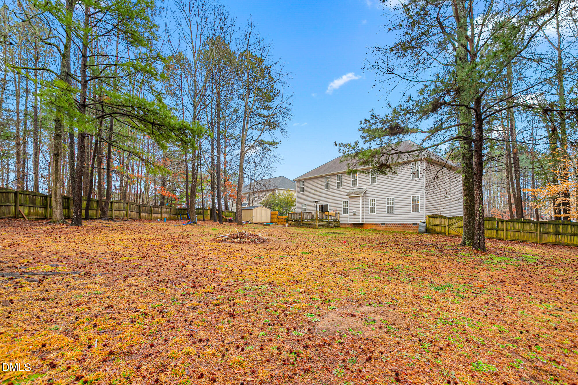 1205 Magnolia Hill Road Garner, NC 27529 - Photo 37 of 41 a house with trees in front of it