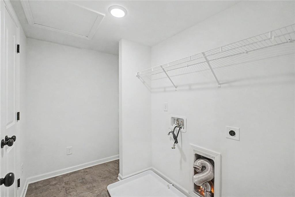 2310 Portrush Way Southeast Atlanta, GA 30339 - Photo 36 of 38 a view of a storage & utility room with a washer dryer