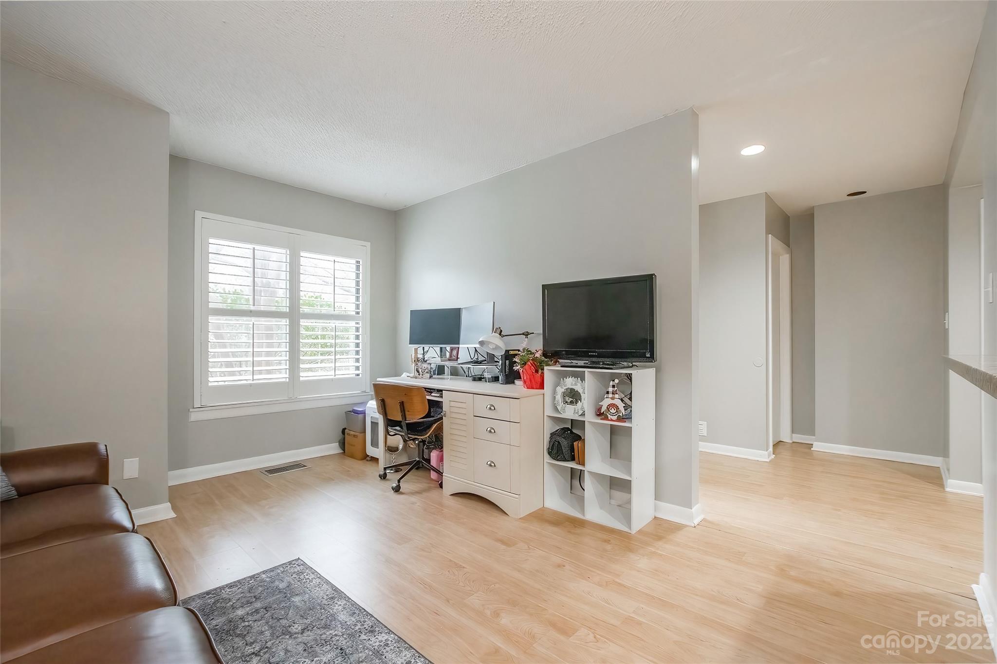 93 Ridgeport Road Lake Wylie, SC 29710 - Photo 11 of 38 a view of a livingroom with workspace and a window