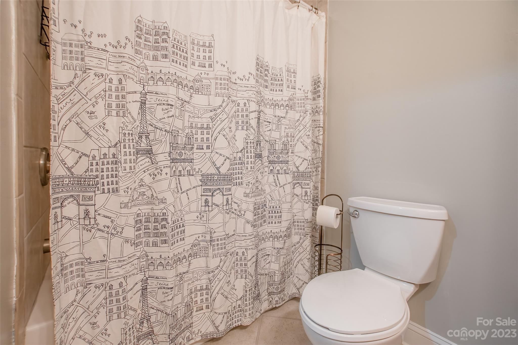 93 Ridgeport Road Lake Wylie, SC 29710 - Photo 23 of 38 a white toilet sitting next to a shower curtain