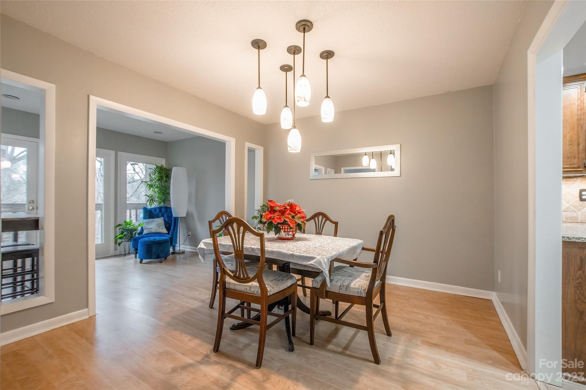 93 Ridgeport Road Lake Wylie, SC 29710 - Photo 9 of 38 a view of a dining room with furniture and chandelier