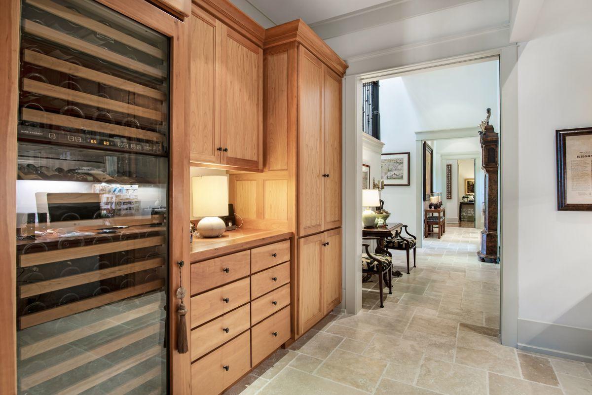 2955 Pine Valley Road Miramar Beach, FL 32550 - Photo 19 of 33 a view of a hallway with dining area and chandelier